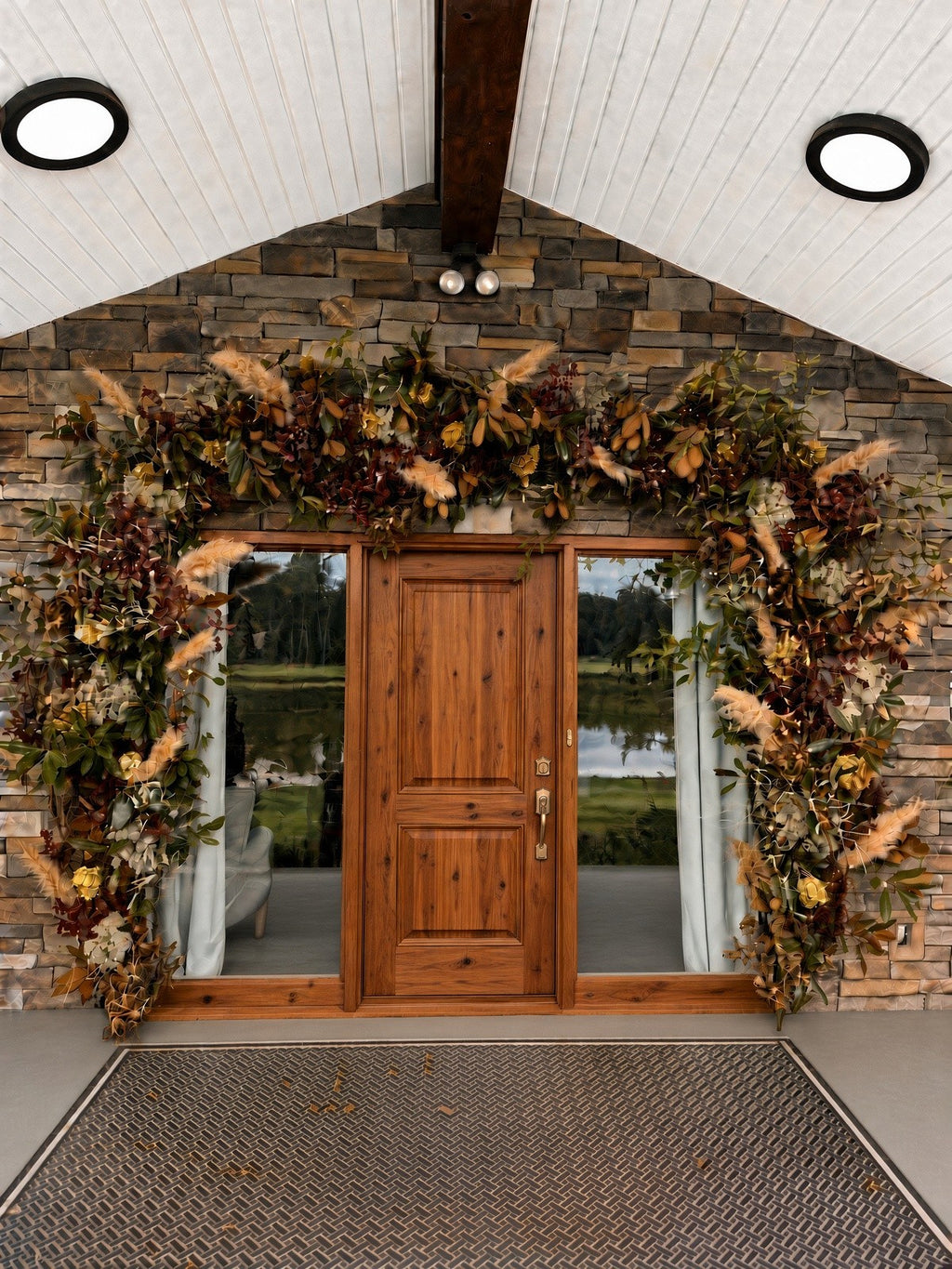 Welcome Home Arch - FULL: magnolia, pampas, and dried florals arching around a wood front door